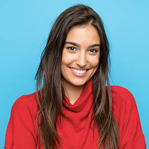 woman with long dark hair smiling