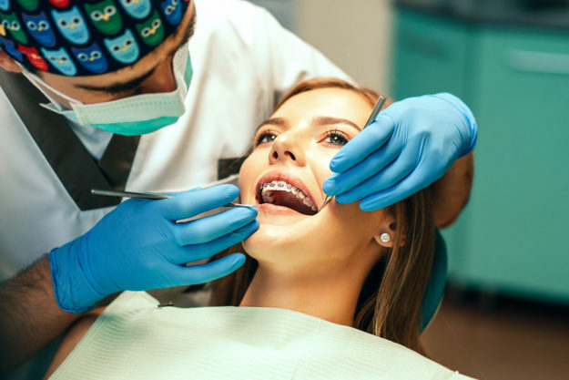 10 Methods for Treating a Chipped Tooth dentist treating a chipped tooth