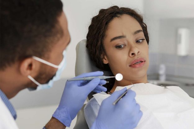 dental-fear woman having dental fear