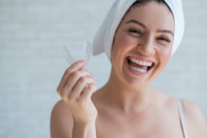 woman using dental nightguard