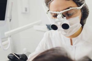 dentist helping a patient with periodontics