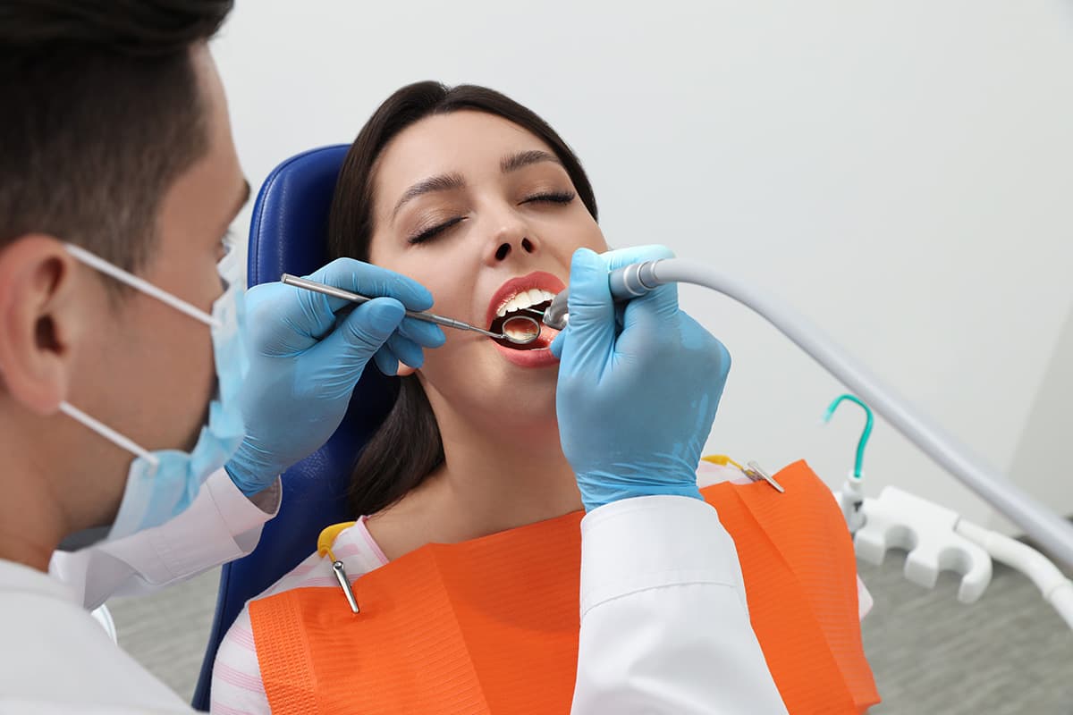 cavity services woman receiving cavity services