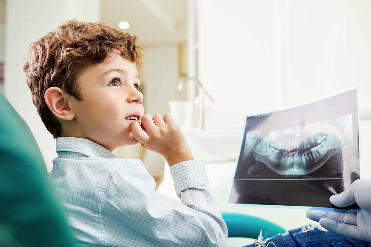 Does-My-Child-Need-To-See-an-Orthodontist- boy in need of a pediatric orthodontist