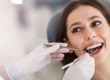 woman learning about a pediatric dentist