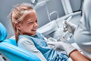 young girl receiving pediatric dentistry services